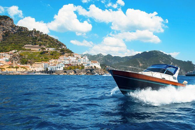 Amalfi Coast Boat Tour With Pickup from Sorrento Area Hotels - Snorkeling stop, snacks, and onboard comforts you’ll appreciate