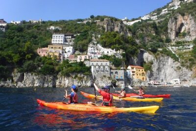 Amalfi Coast Kayak Tour: Explore Caves, Arches & Hidden Beaches - Stop 1 in Amalfi: beaches, arches, caves, and that Arc of Lovers