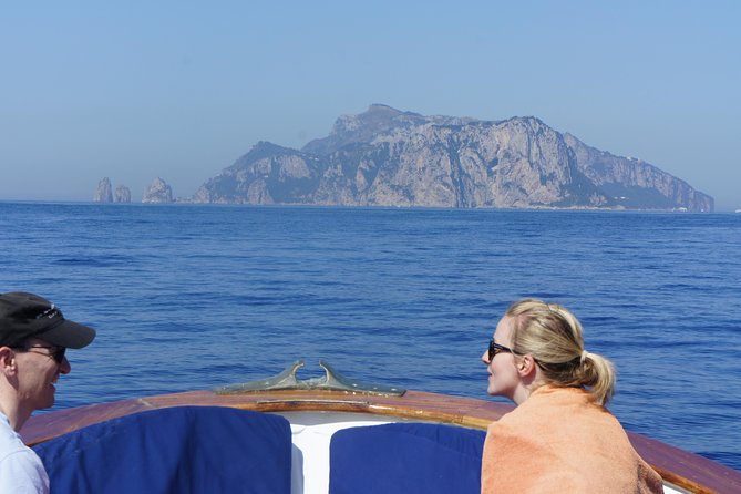 Capri & Blue Grotto Small Group Full-Day Boat Tour from Positano - White Grotta, Natural Arch, Faraglioni, and Grotta Verde: quick stops with big payoff