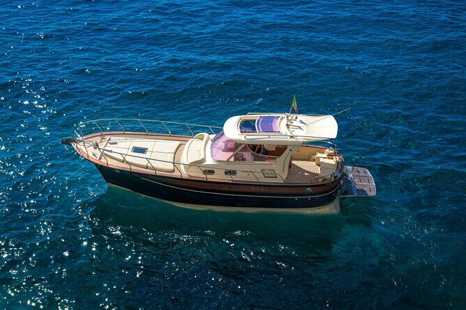 Capri: discover the beauties of the island aboard a Luxury Boat - Blue Grotto add-on: plan for the ticket and timing