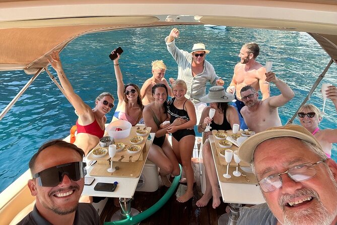 Capri Premium Private Boat Tour + City Visit - Grotta dei Santi: Light, Stalactites, and a Quick Underwater Feeling