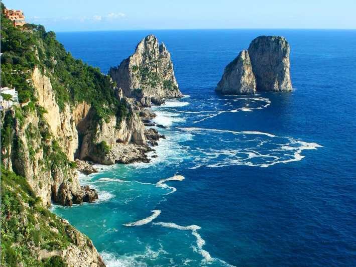 From Amalfi: Group Boat Tour to Capri with Swimming - Punta Campanella Swim Stop: Best Time to Put Your Feet In
