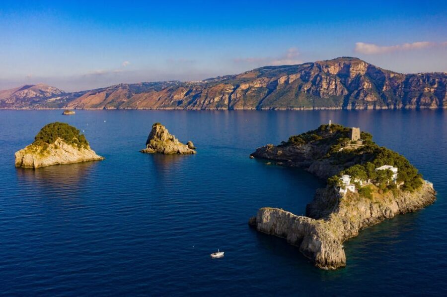 From Amalfi: Group Boat Tour to Capri with Swimming - Getting to Capri: Fast Photos and Then Reality