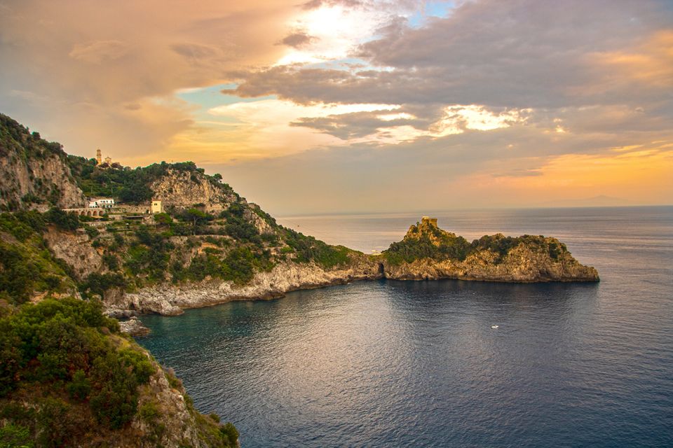 From Amalfi: Private Sunset Cruise along the Amalfi Coast - Positano cliffs, distant Faraglioni, and why the timing matters