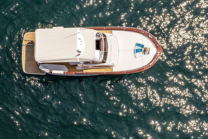 Full Day Private Boat Tour to Capri from Positano - Capri’s coastal stops: Marina Grande and Bagni di Tiberio