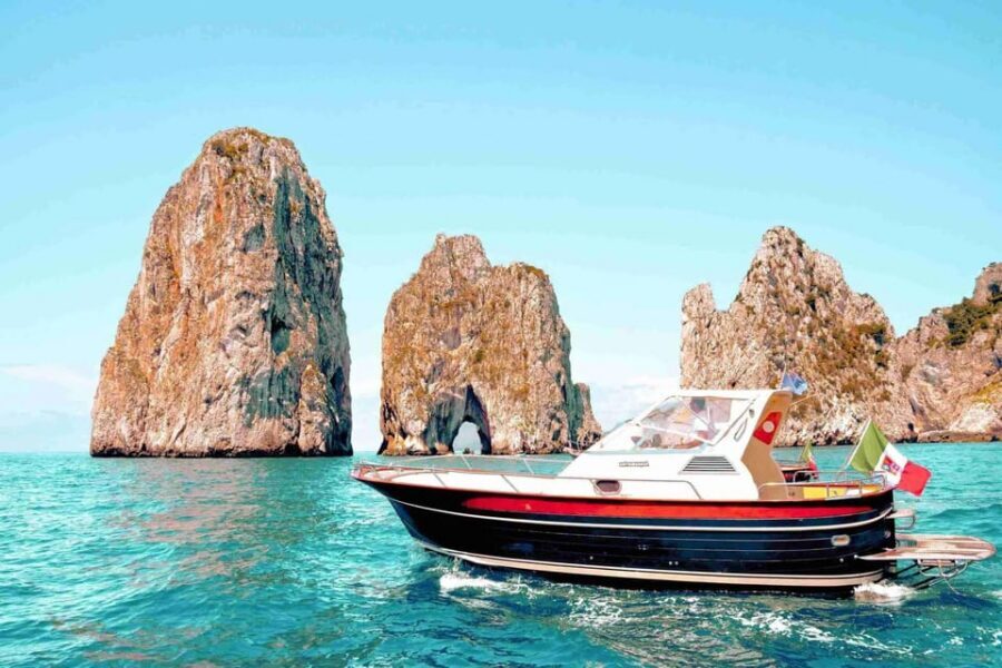 Positano: Capri and Blue Grotto Shared Boat Tour with Drinks - Positano pickup and the calm start to a busy coast