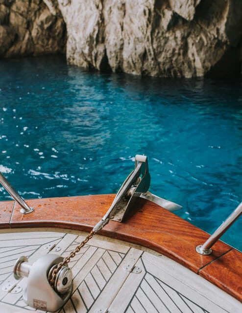Positano: Capri and Blue Grotto Shared Boat Tour with Drinks - Swim stop and drinks at sea: when the tour turns fun