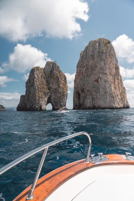 Positano: Capri and Blue Grotto Shared Boat Tour with Drinks - Limoncello tasting on the return: a small finish that fits