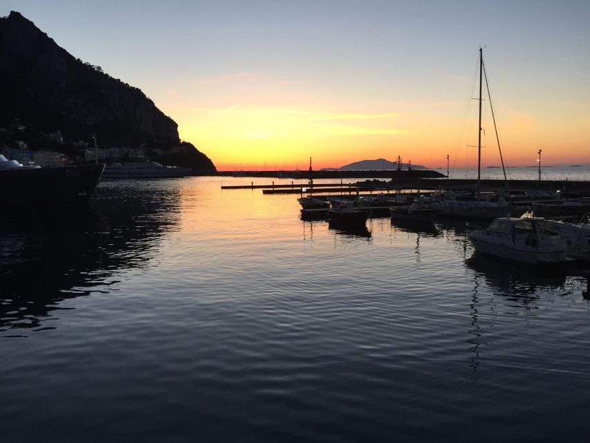 Positano: Sunset Cruise Day Trip with Drinks and Snacks - Swim Stops and Sunbathing: When the Coast Turns Into a Beach Day