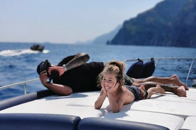 Private Boat Tour of Capri from Positano - Marina Piccola: sun-facing views, siren rock, and lunch-area energy