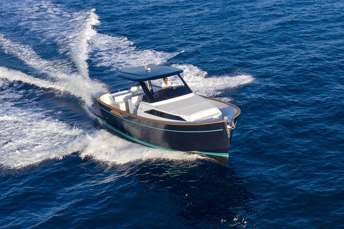 Private Full-day Luxury Boat Tour to Capri from Amalfi Coast - Cruising the Amalfi Coast Edge: The Tower and the Sea-Sky Views