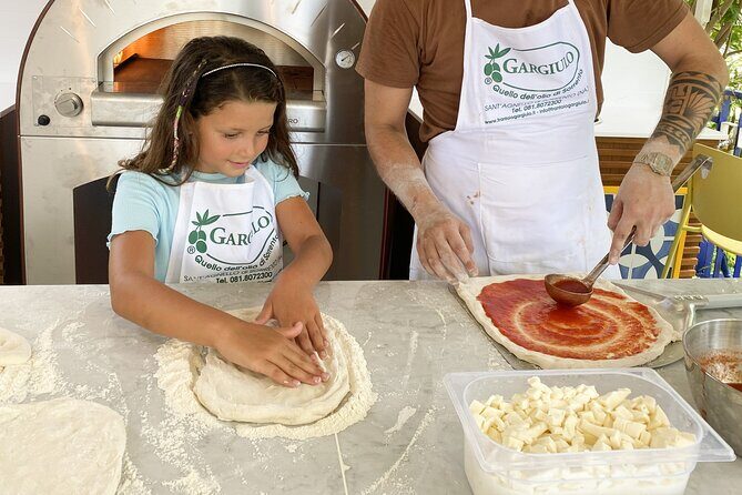Sorrento Pizza School Activity in Italy - The tasting lineup: olive oil, cheeses, salami, wine, and limoncello